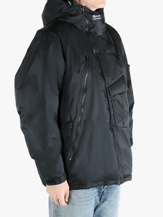 Black jackets-coats worn by a person, showing the jackets-coats fit