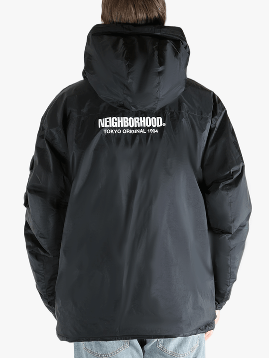 Black jackets-coats worn by a person, showing the jackets-coats fit