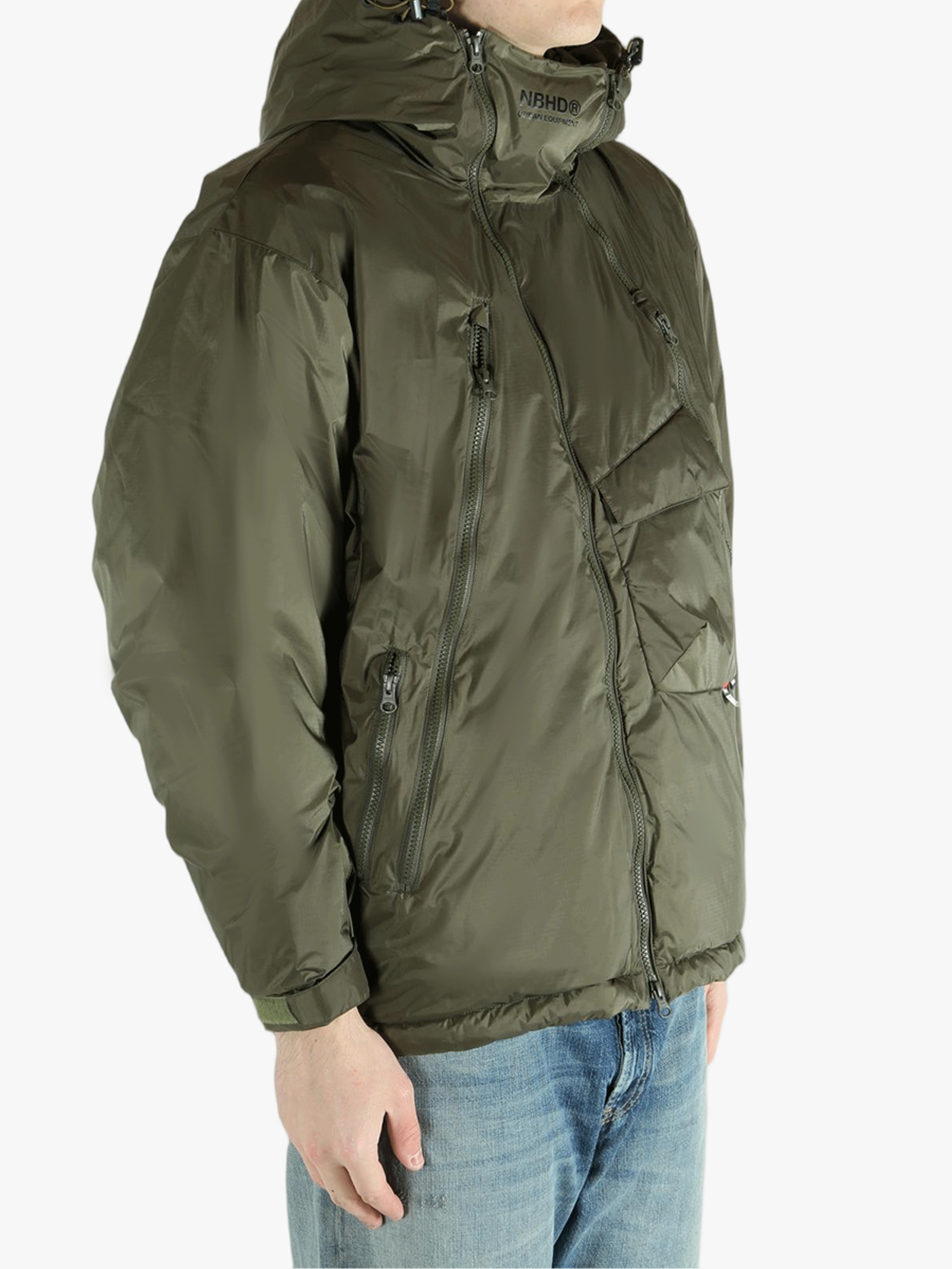 Green jackets-coats worn by a person, showing the jackets-coats fit