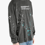 Black t-shirt worn by a person, showing the t-shirt fit