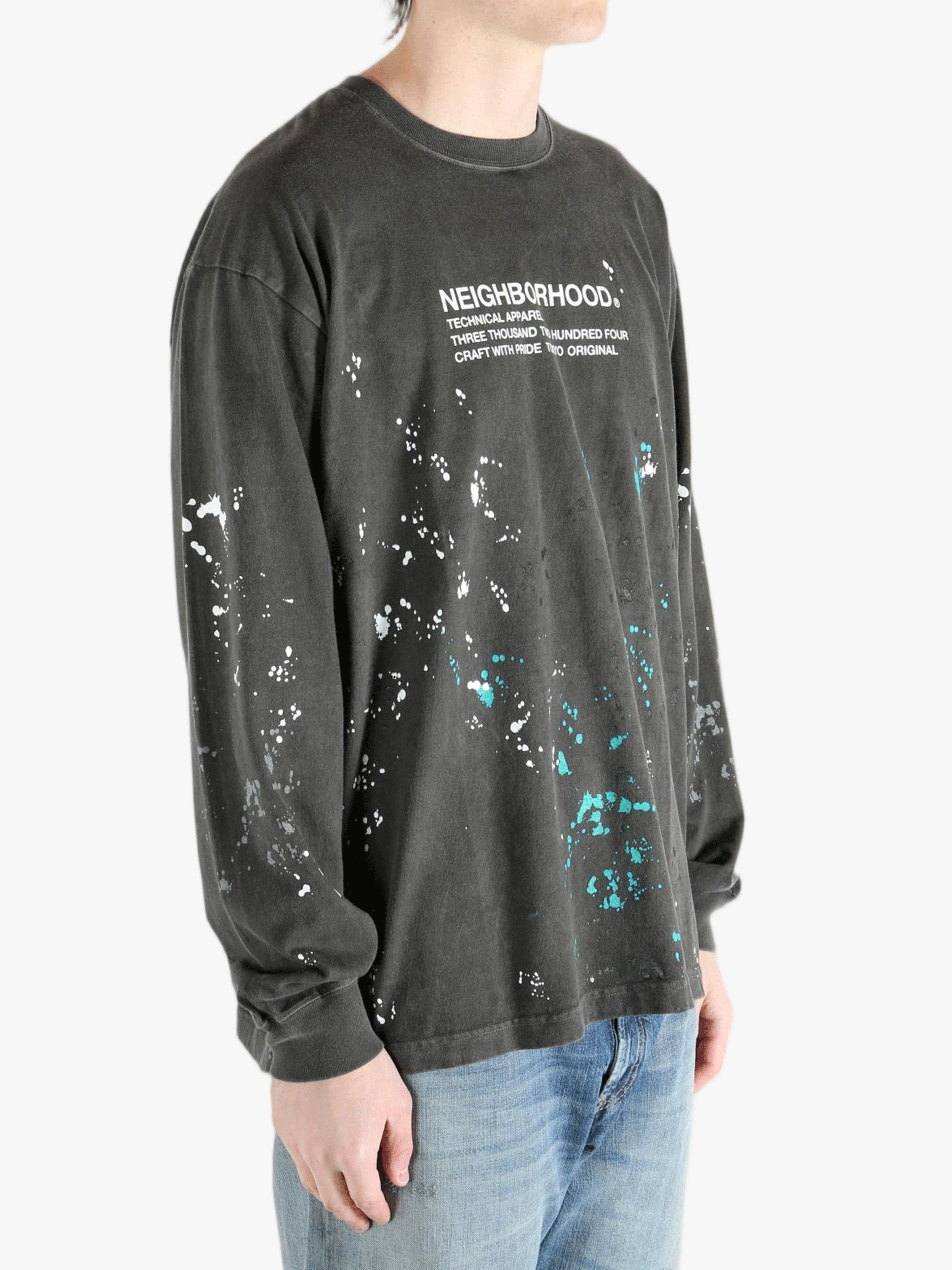 Black t-shirt worn by a person, showing the t-shirt fit