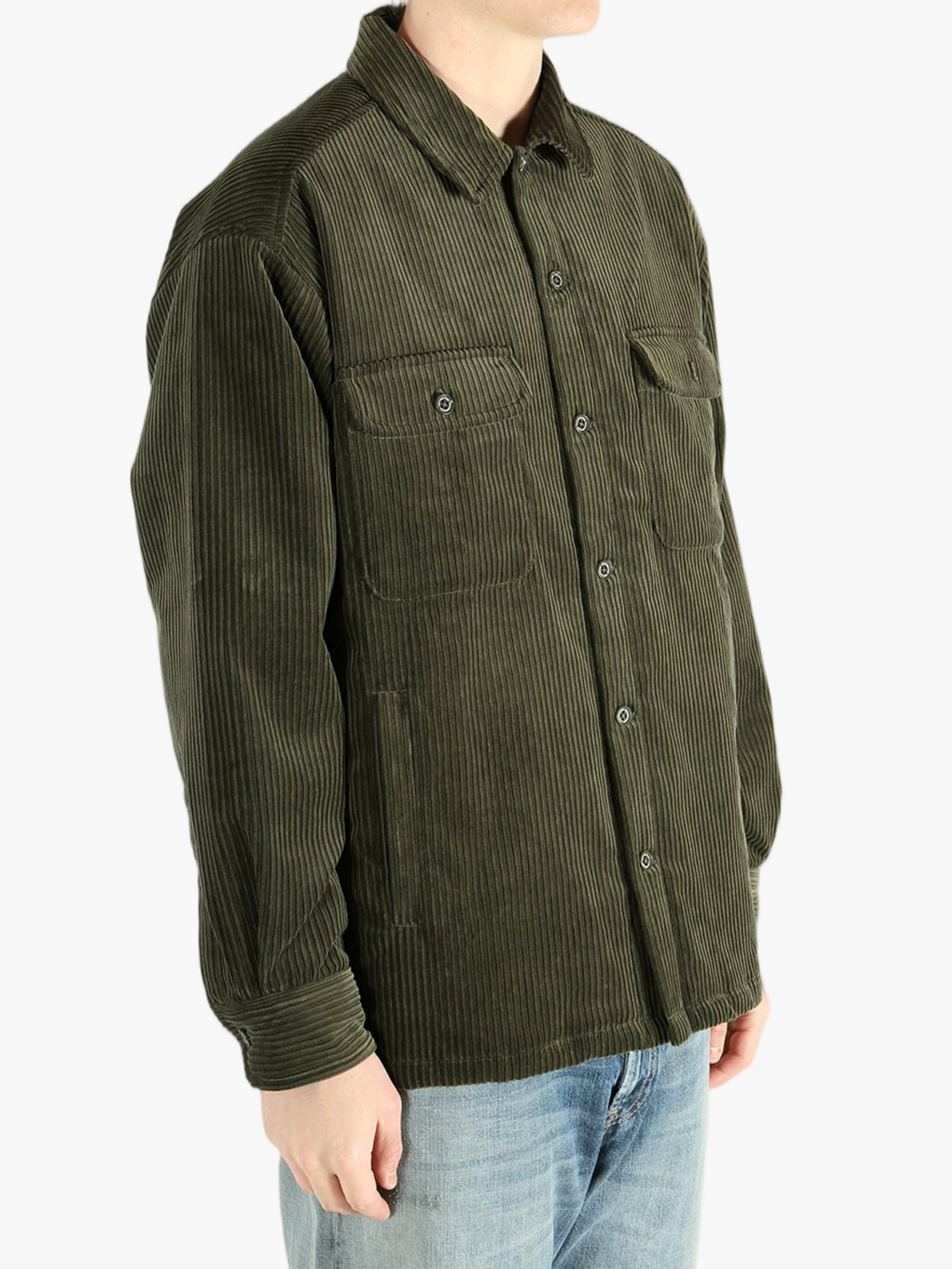 Green shirt worn by a person, showing the shirt's fit