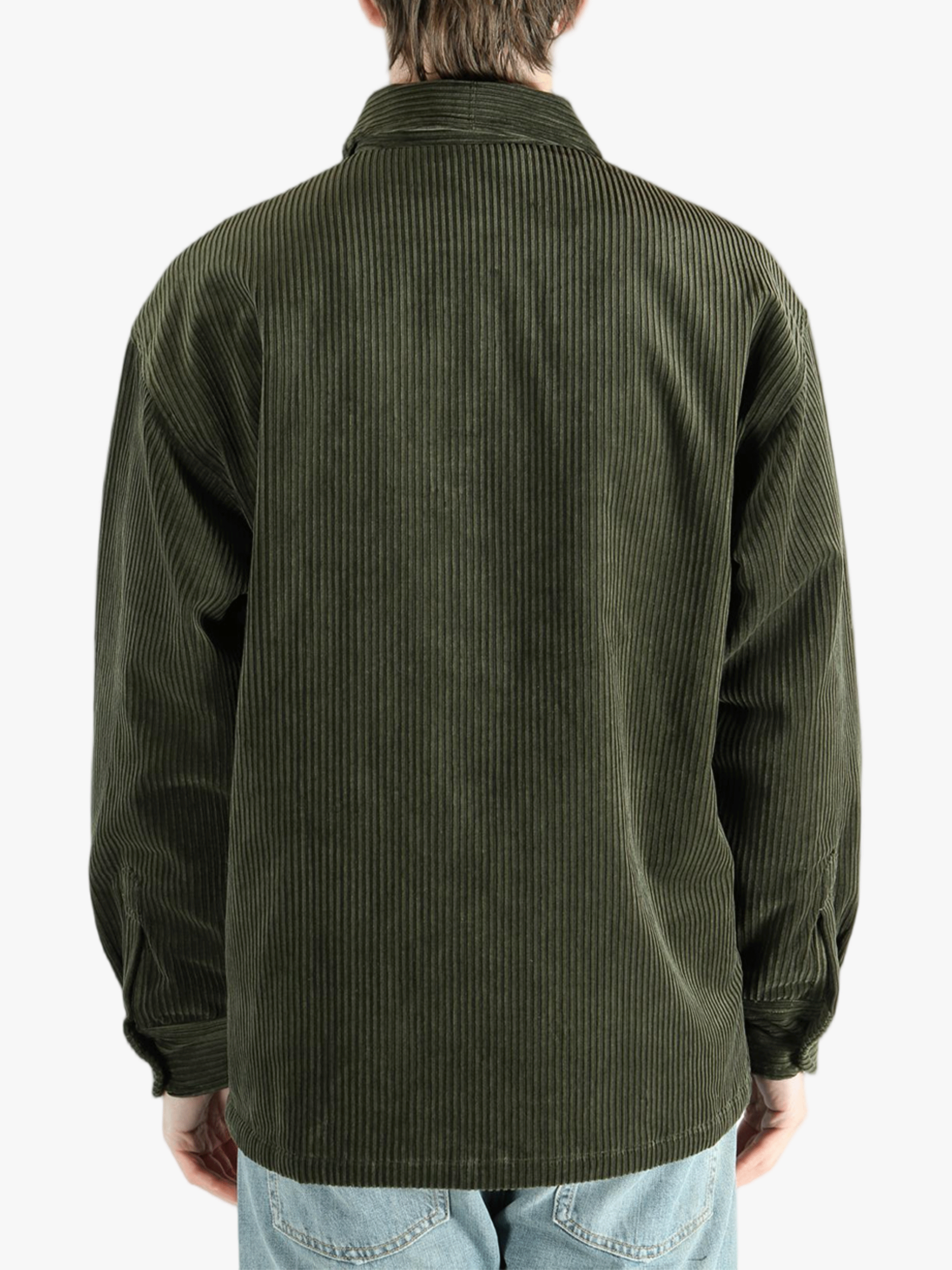 Green shirt worn by a person, showing the shirt's fit