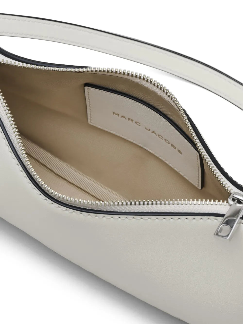 Close up of the white bag, showing texture of the leather fabric