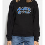 Black hoodies worn by a person, showing the hoodies fit