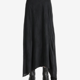 Black dress worn by a person, showing the dress' fit