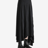 Black dress worn by a person, showing the dress' fit