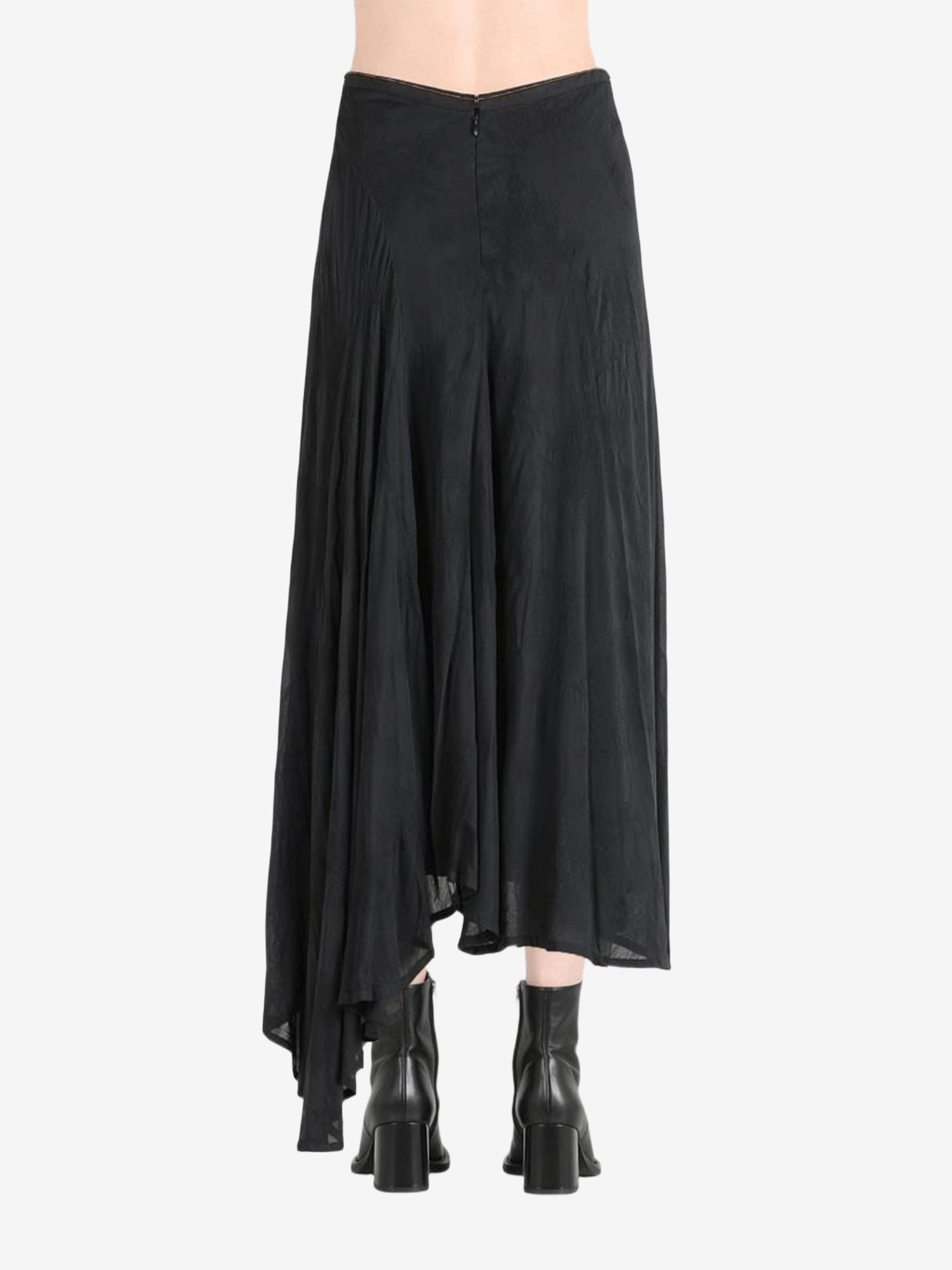 Black dress worn by a person, showing the dress' fit