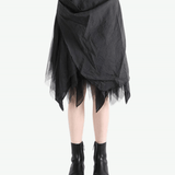 Black dress worn by a person, showing the dress' fit
