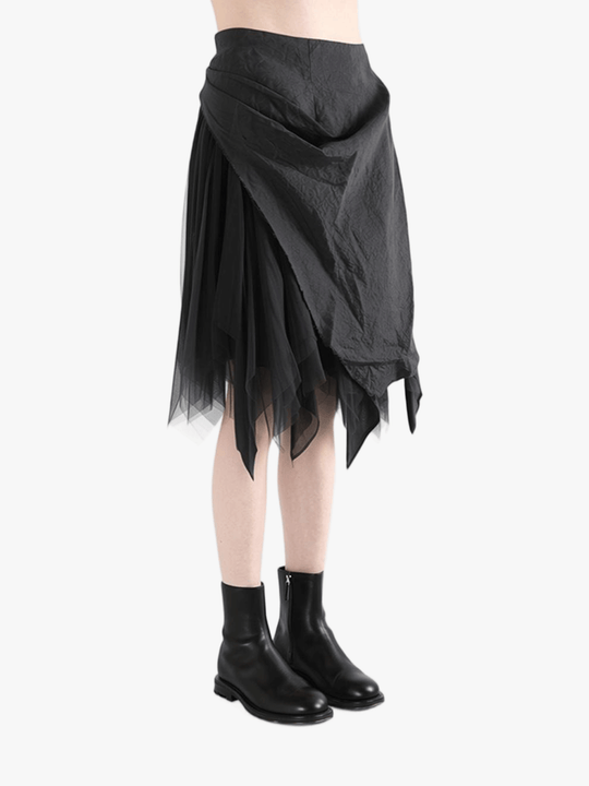 Black dress worn by a person, showing the dress' fit