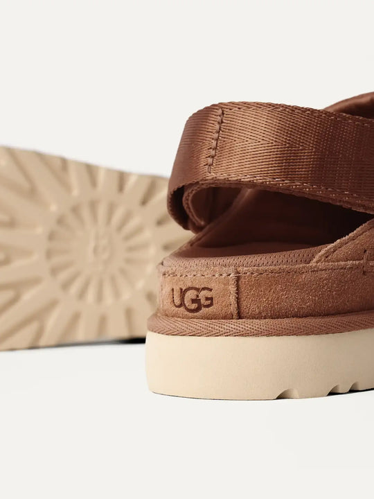Close up of brown shoes, showing texture of the suede fabric