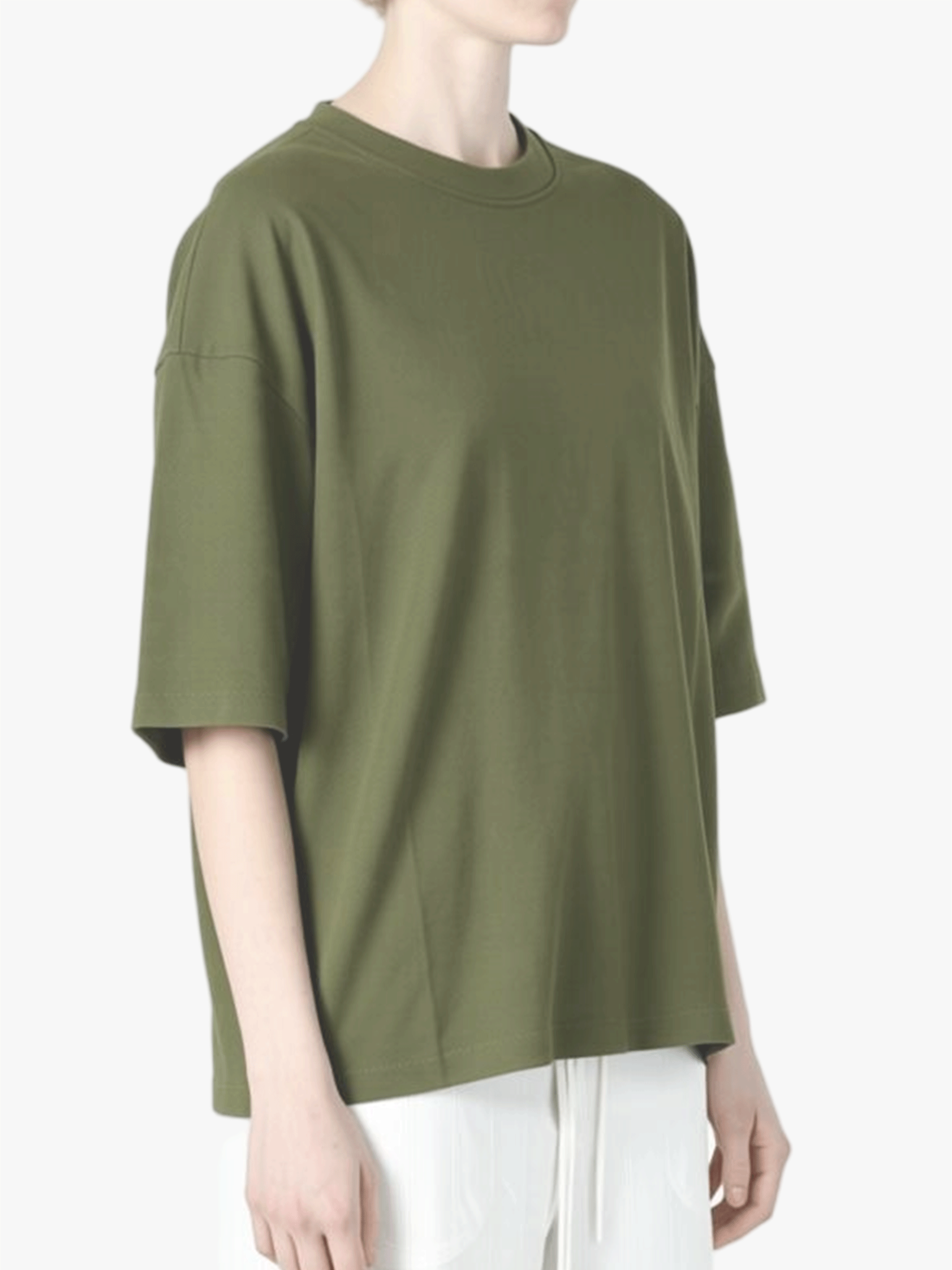 Green t-shirt worn by a person, side view