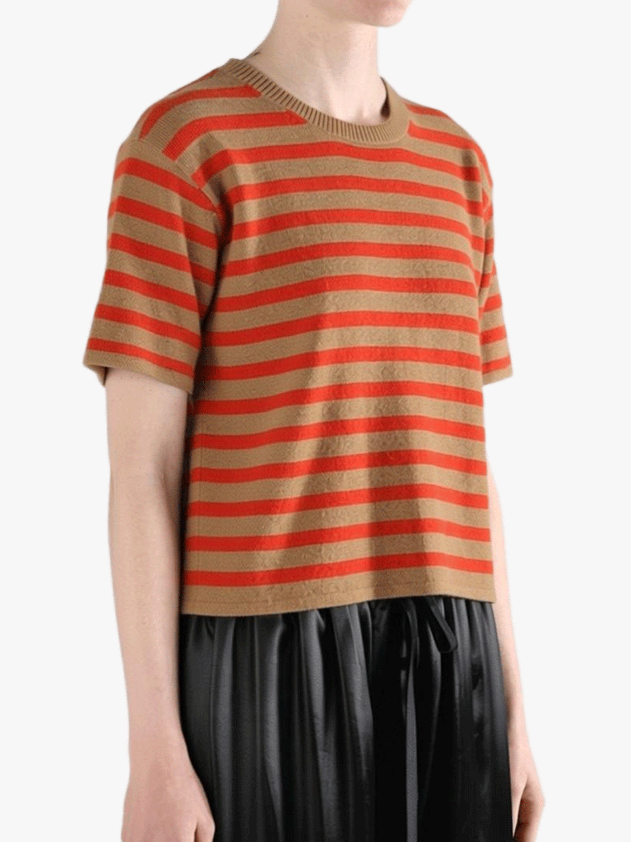 Brown t-shirt worn by a person, side view