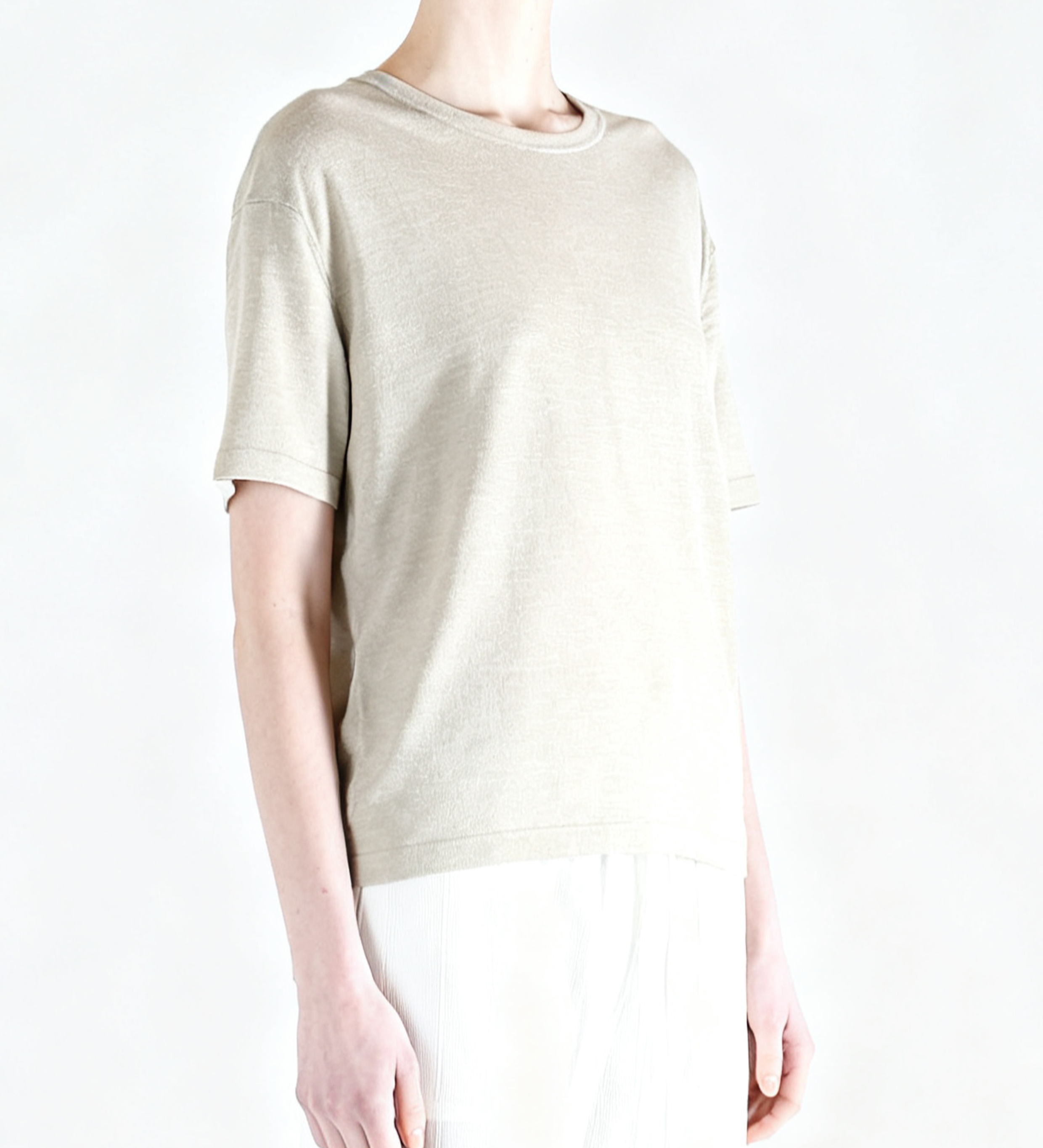 White t-shirt worn by a person, side view