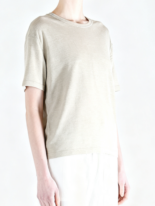 White t-shirt worn by a person, side view