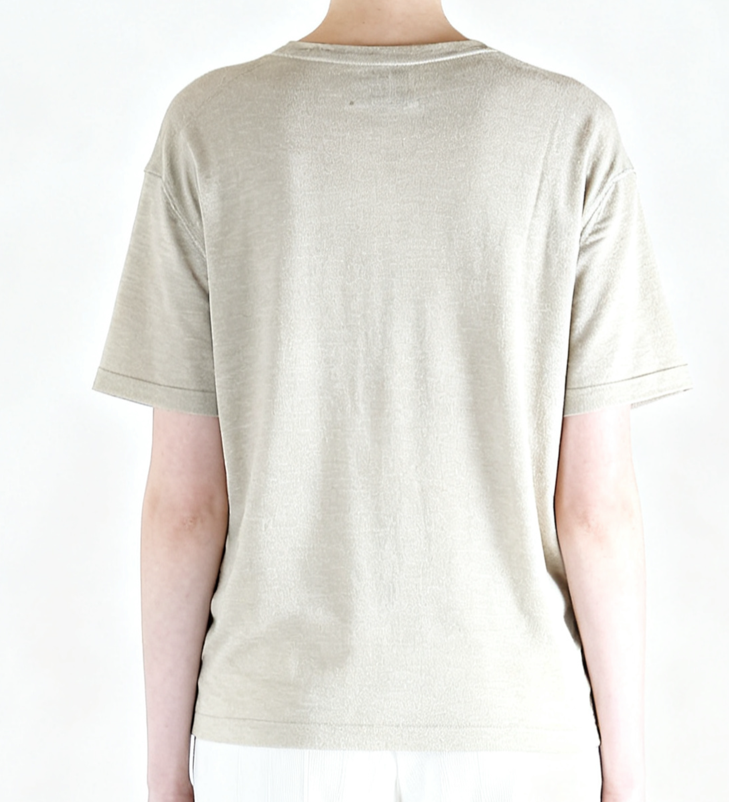White t-shirt worn by a person, back view