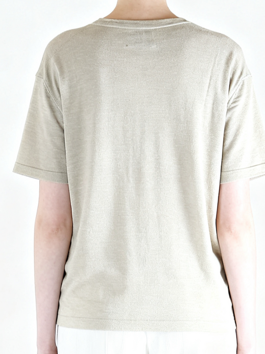 White t-shirt worn by a person, back view