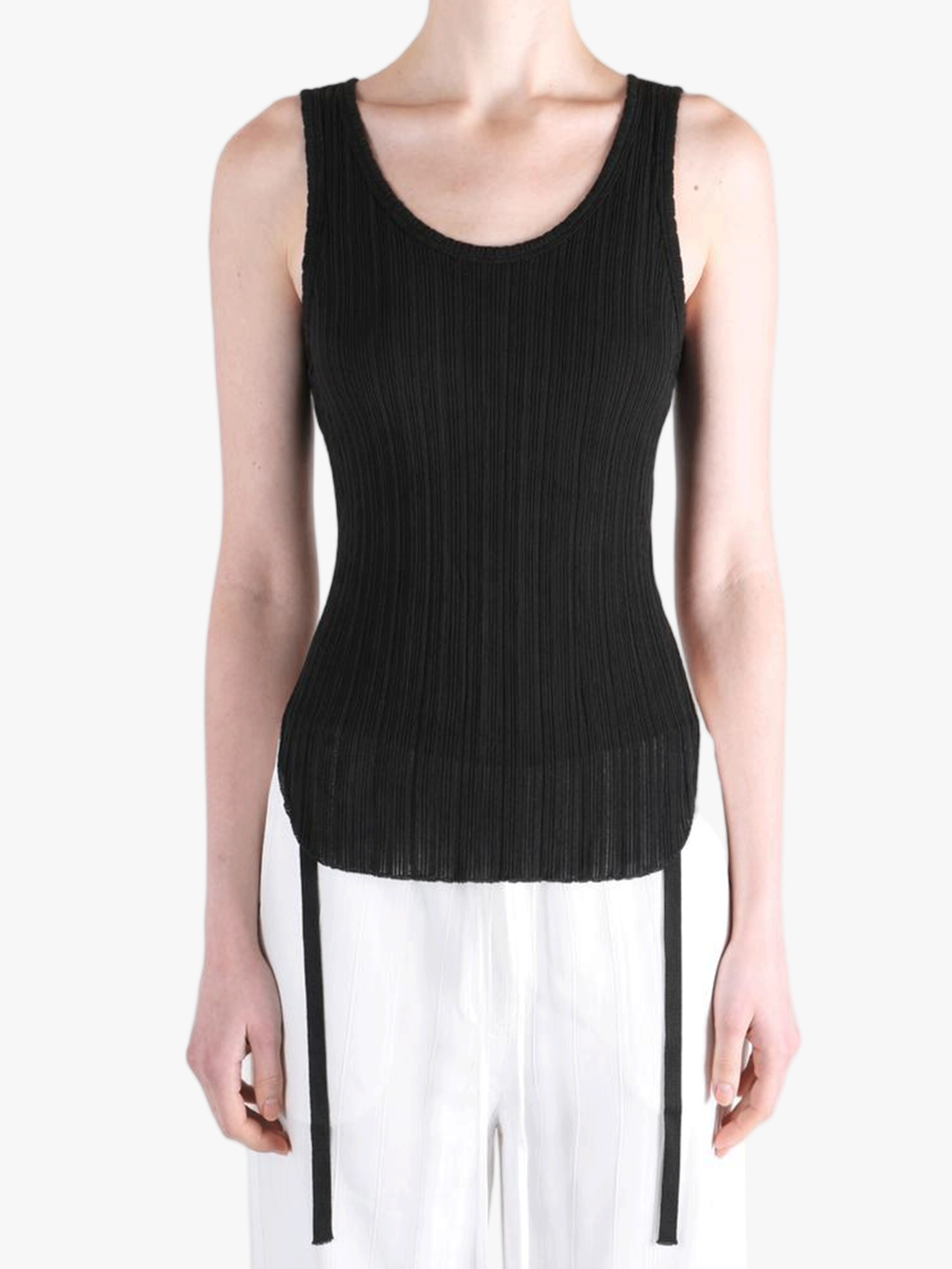 Black top worn by a person, showing the top fit