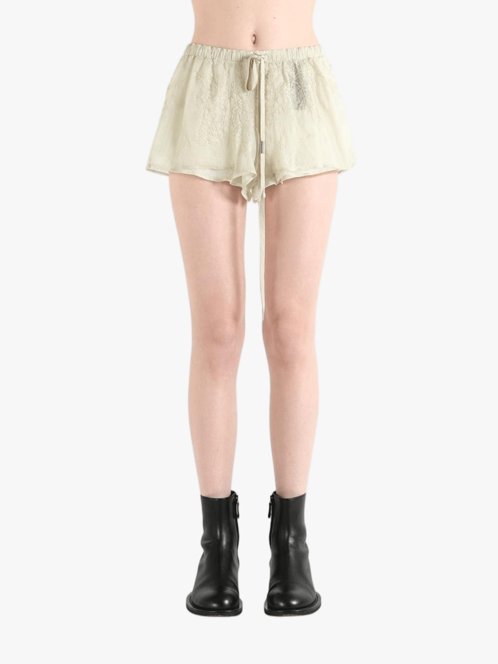 Tan shorts worn by a person, showing the shorts' fit 