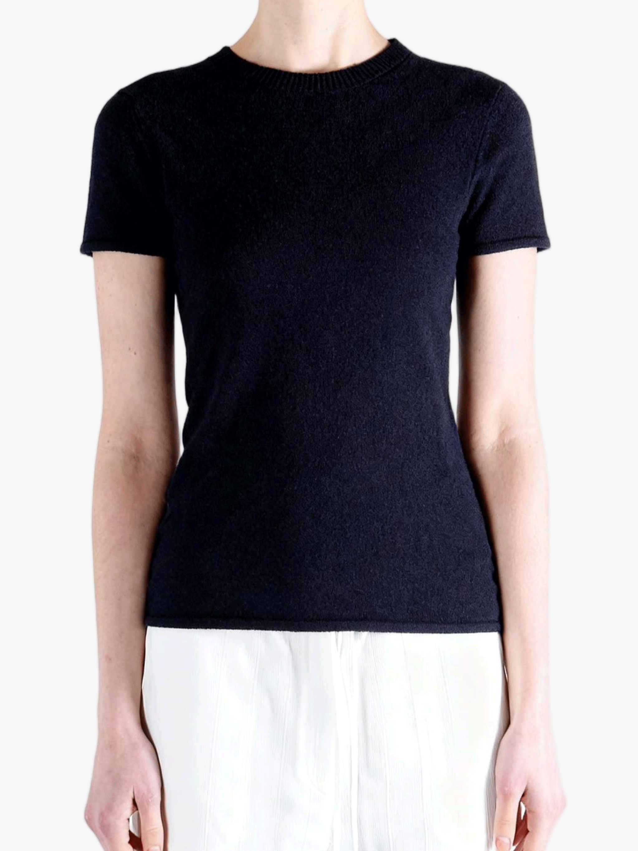 Black t-shirt worn by a person, showing the t-shirt fit