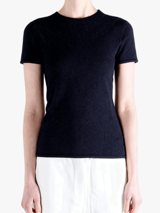 Black t-shirt worn by a person, showing the t-shirt fit