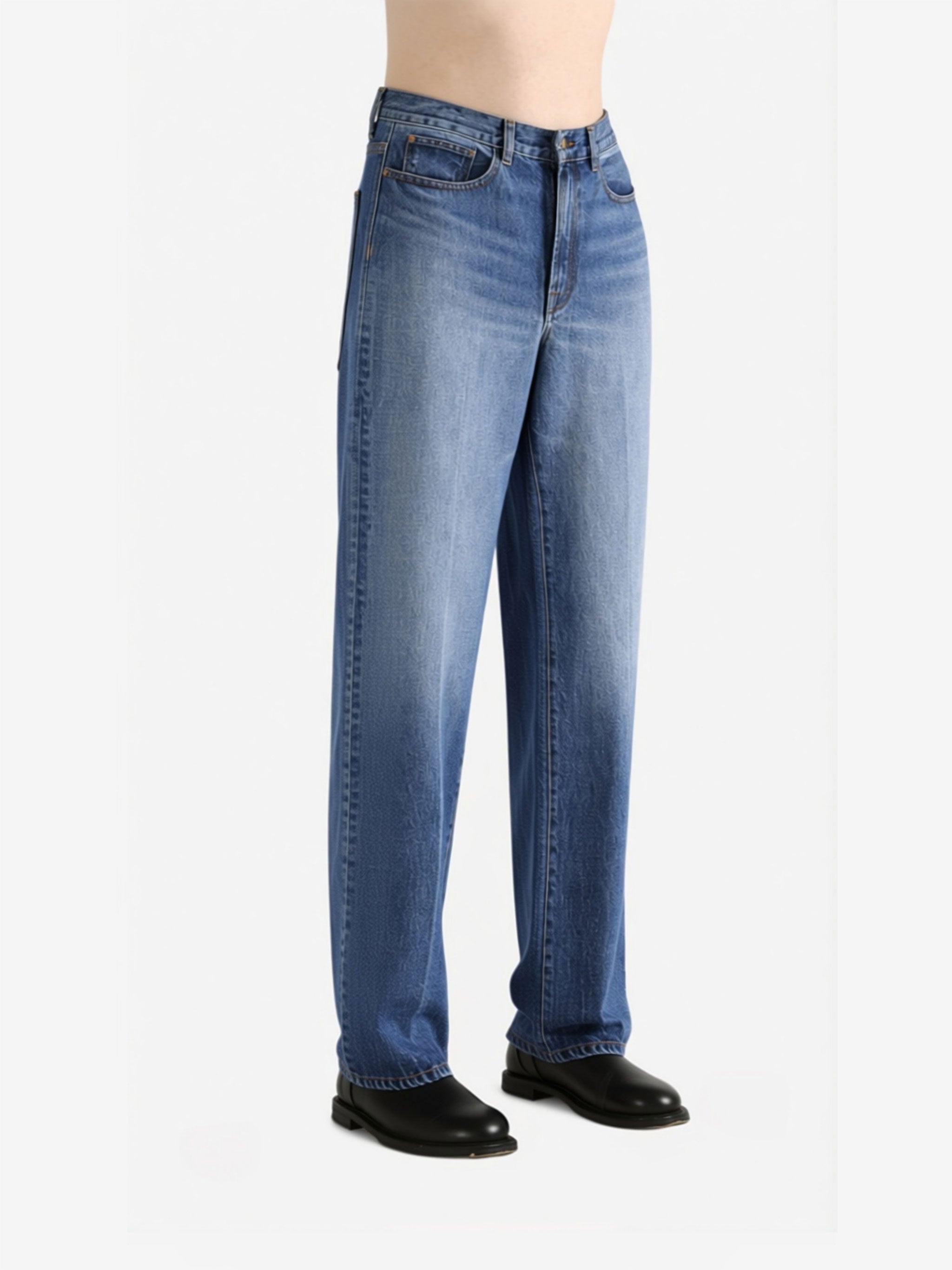 Blue jeans worn by a person, showing the jeans fit