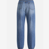 Blue jeans worn by a person, showing the jeans fit