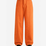 Orange jeans worn by a person,showing the jeans fit
