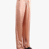 Brown pant worn by a person, showing the pant's fit
