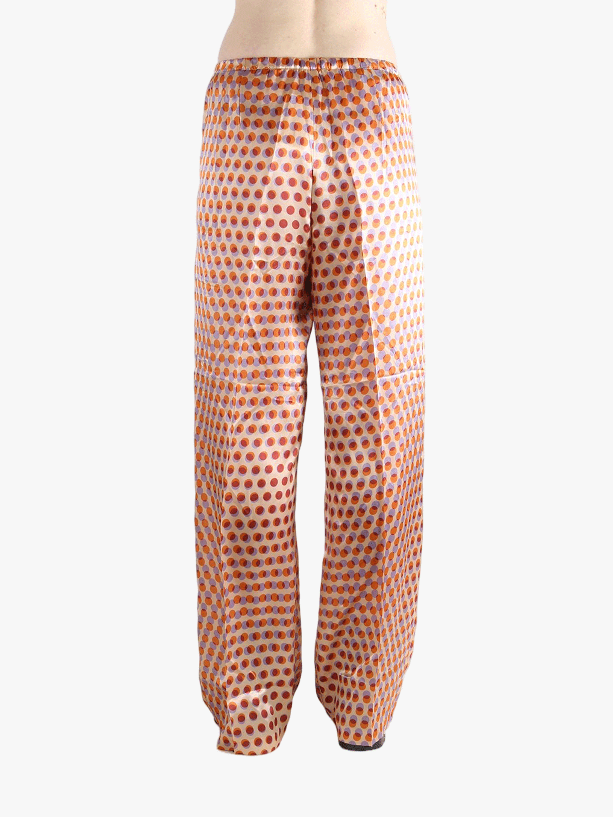 Brown pant worn by a person, showing the pant's fit