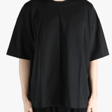 Black t-shirt worn by a person, showing the shirt's fit