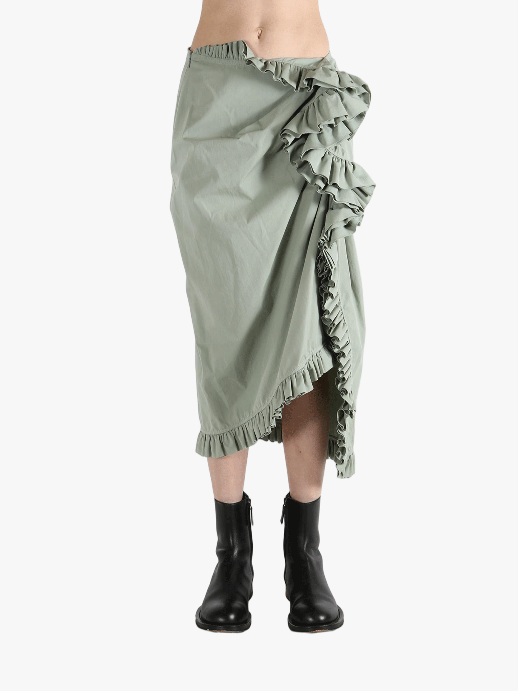 Green dress worn by a person, showing the dress's fit