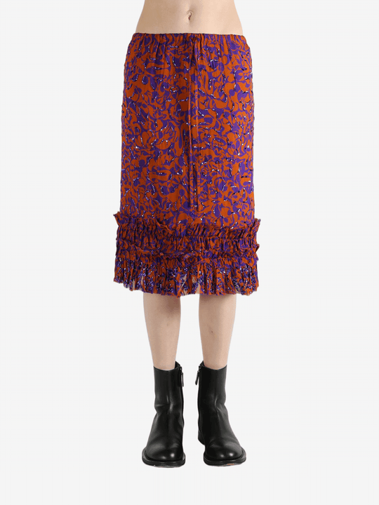 Red dress worn by a person, showing the dress's fit
