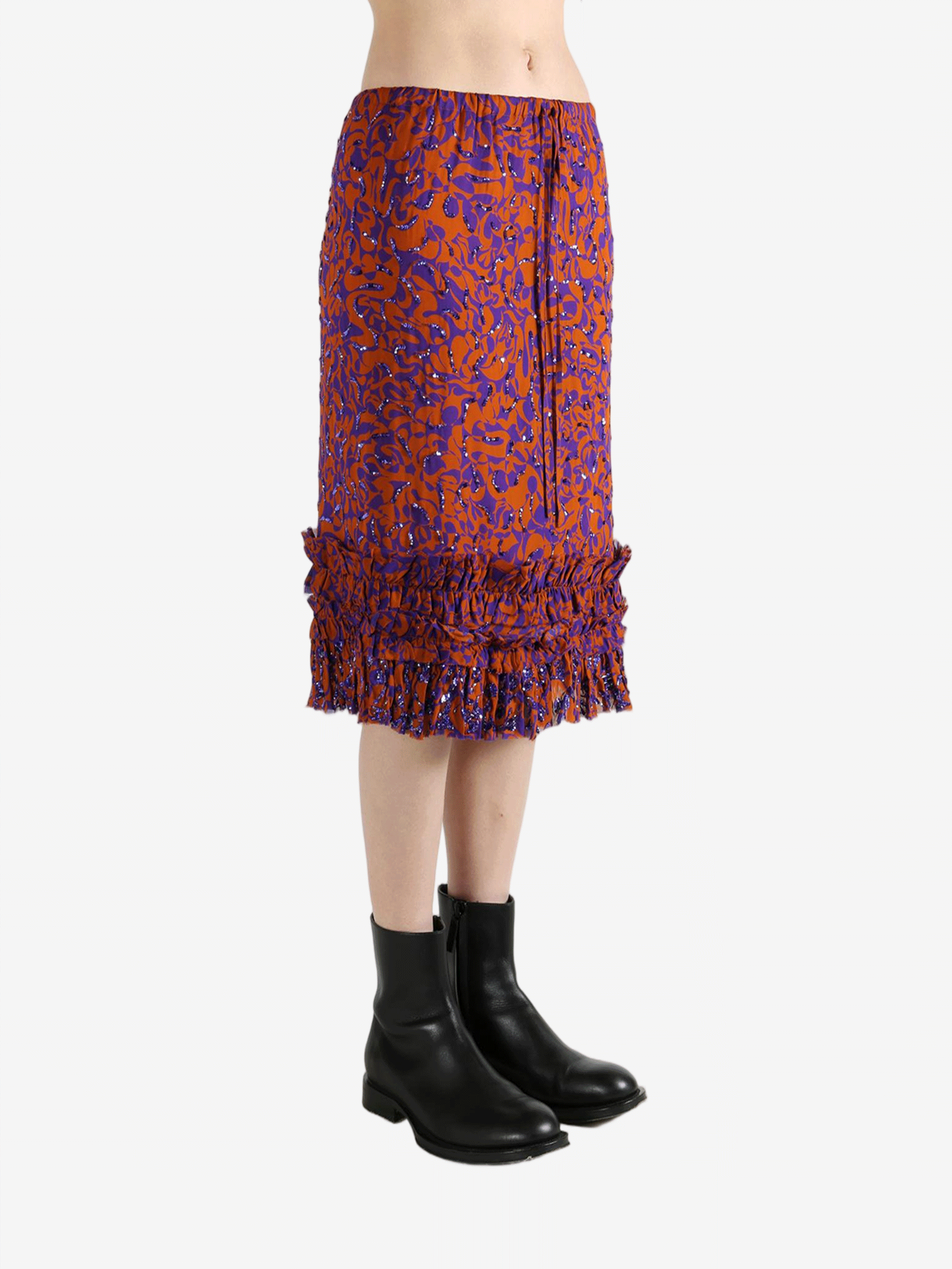 Red dress worn by a person, showing the dress's fit