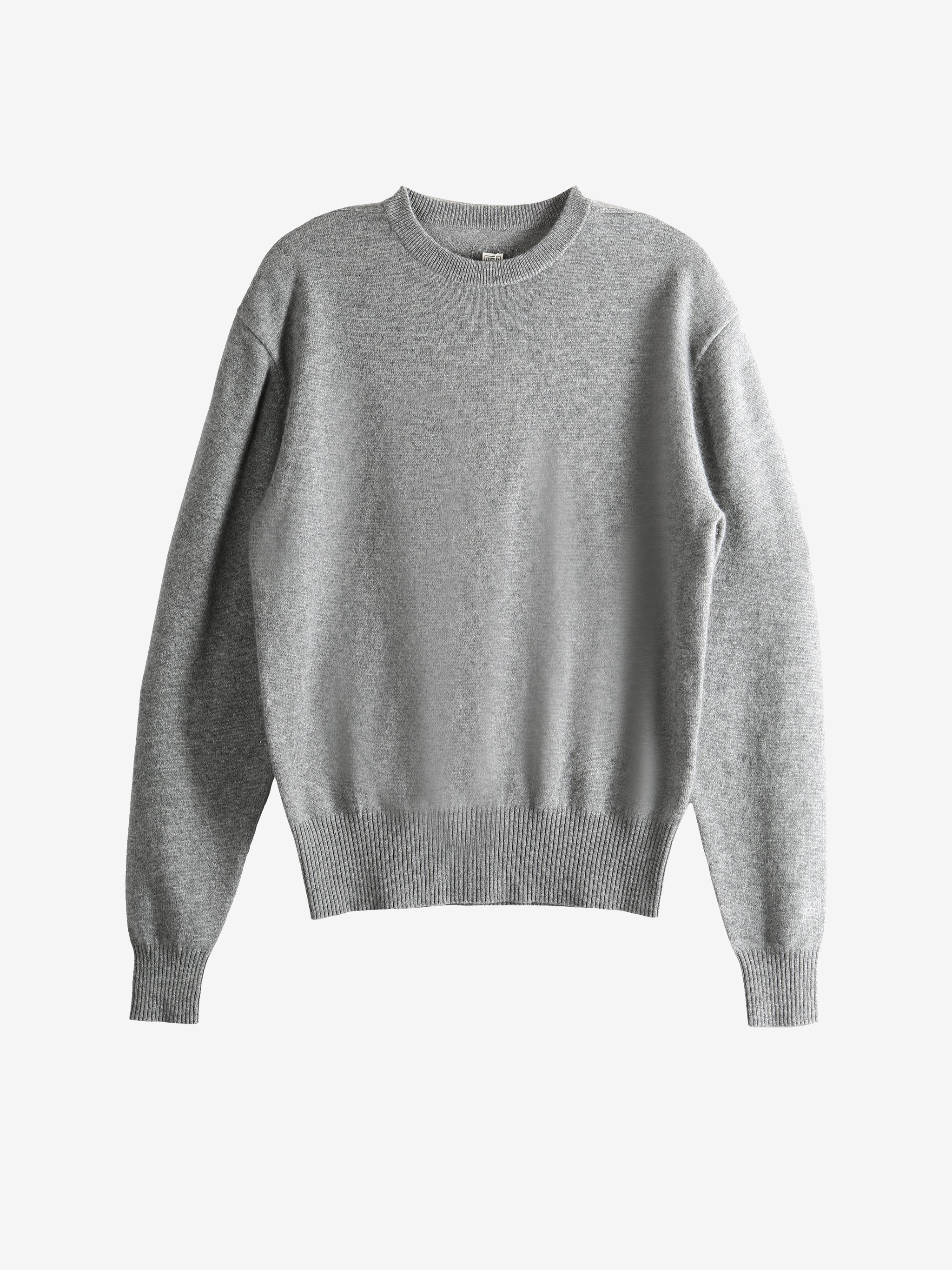 Grey knitwear, front view