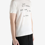 Ivory T-shirt worn by person, shoing the t-shirt fit