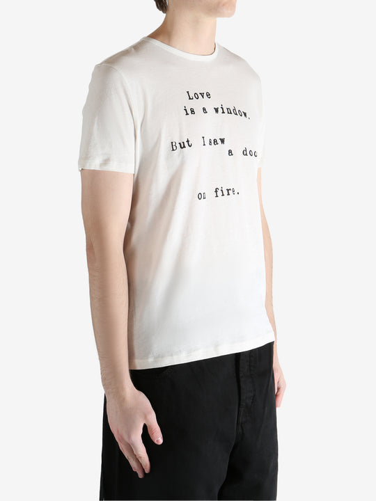 Ivory T-shirt worn by person, shoing the t-shirt fit