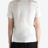 Ivory T-shirt worn by person, shoing the t-shirt fit