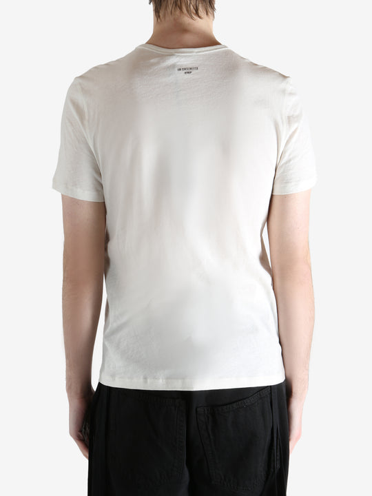 Ivory T-shirt worn by person, shoing the t-shirt fit