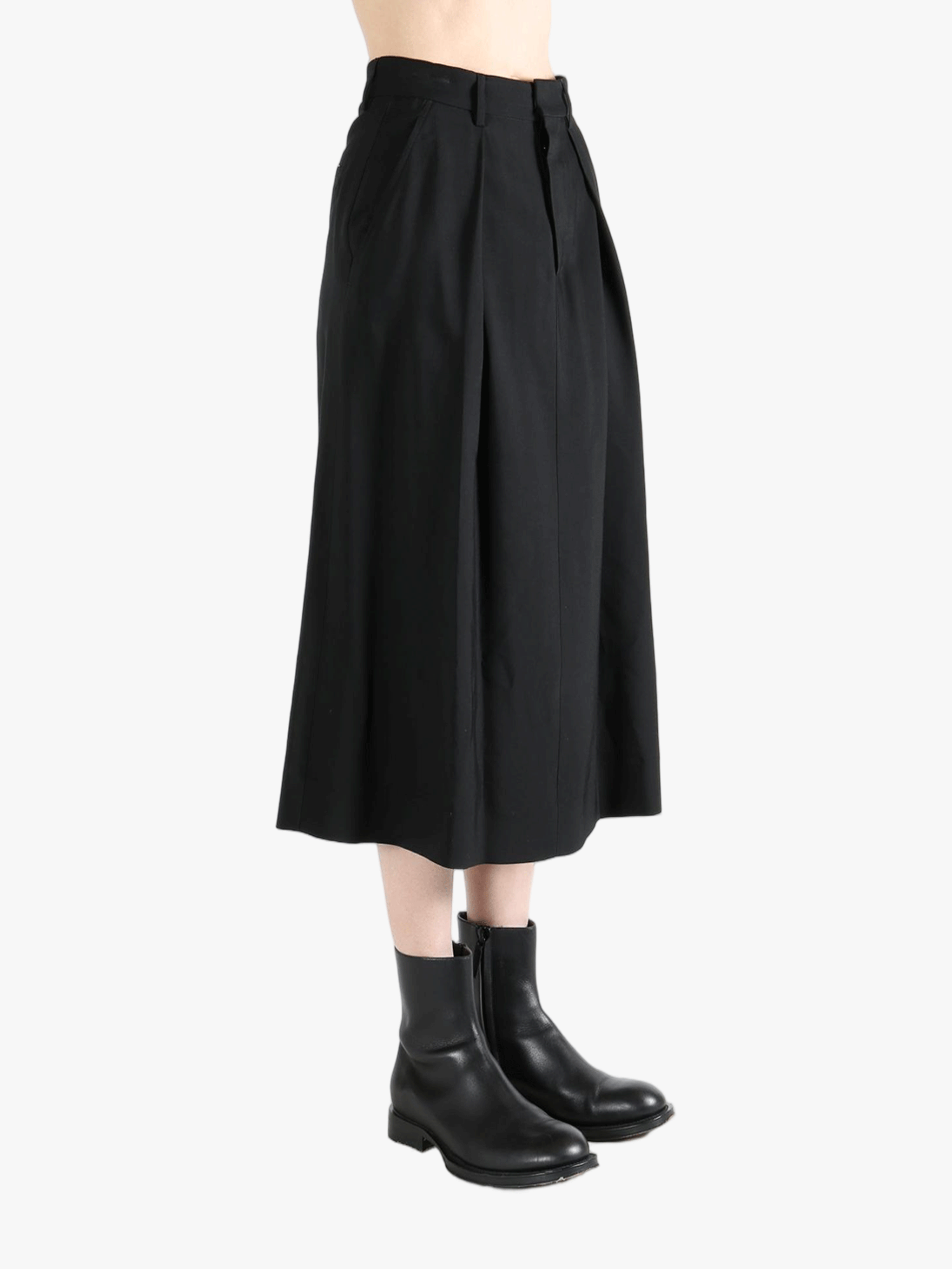 Black skirt worn by a person, showing the skirt's fit