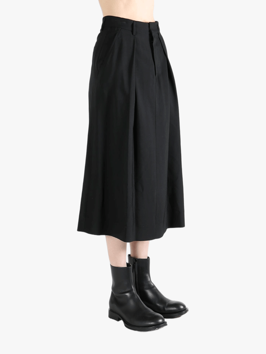 Black skirt worn by a person, showing the skirt's fit