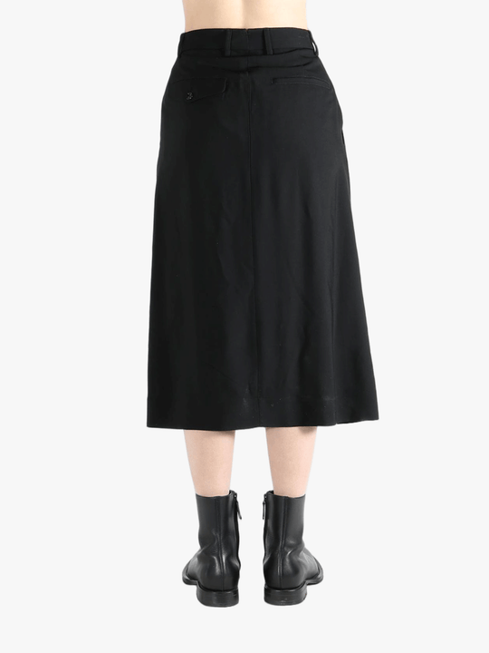 Black skirt worn by a person, showing the skirt's fit