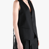 Black top worn by a person, showing the top's fit