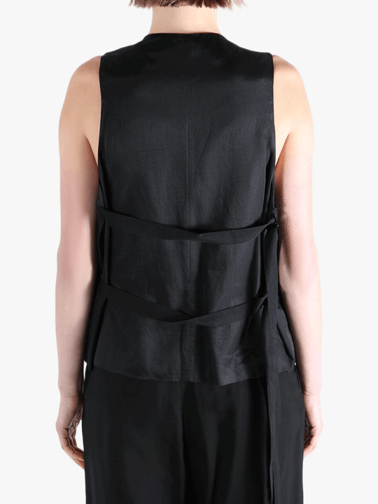 Black top worn by a person, showing the top's fit