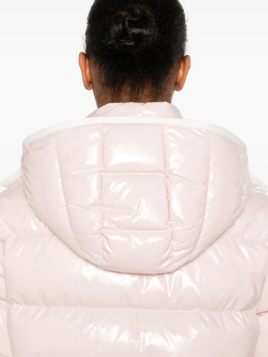 Close up of pink jackets, showing texture of the feather fabric