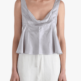 Grey top worn by a person, showing the top's fit