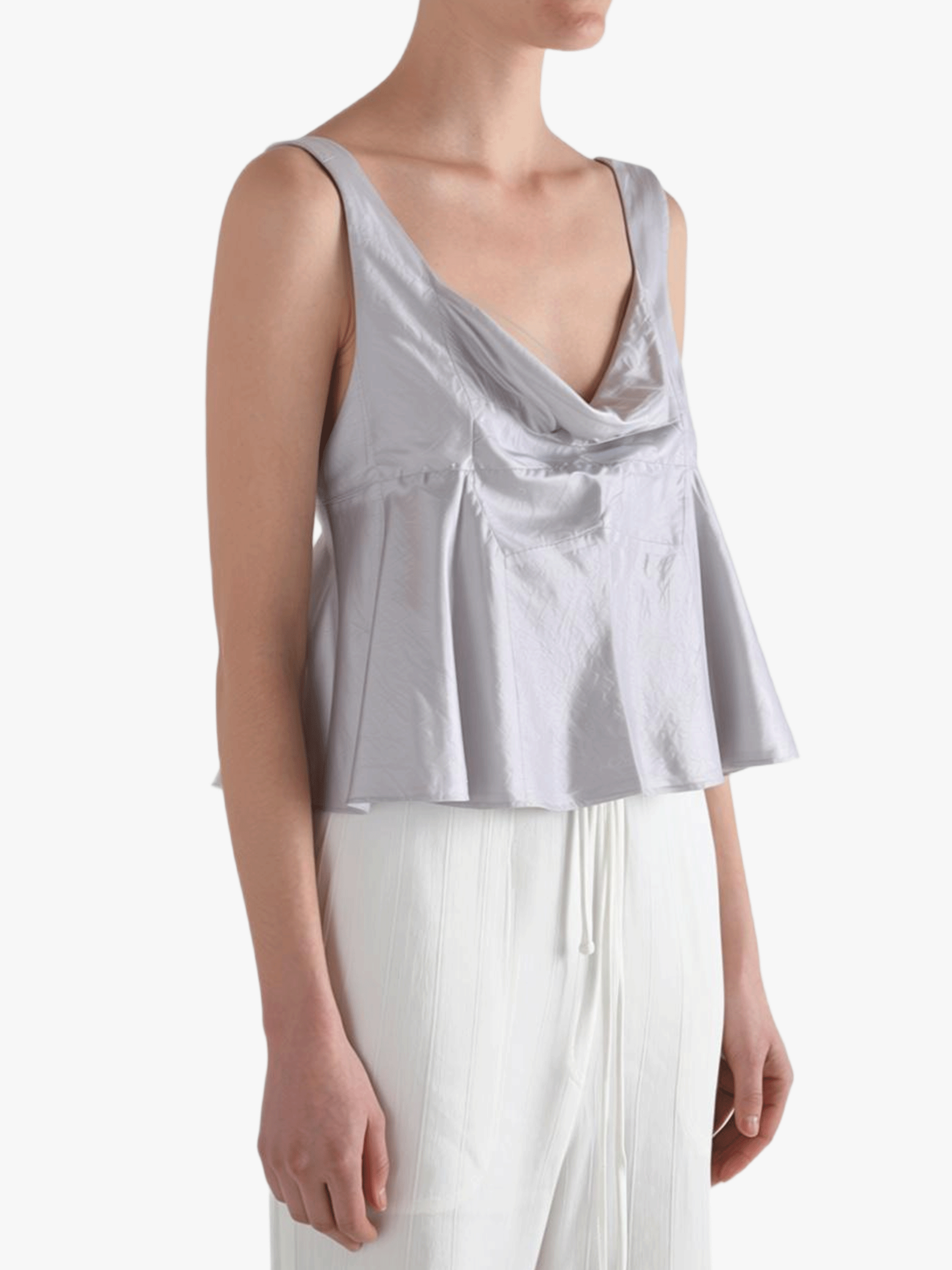 Grey top worn by a person, showing the top's fit