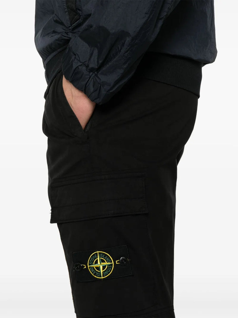 Close up of the black pant, showing texture of the cotton fabric