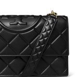 Close up of the black bag, showing texture of the leather fabric