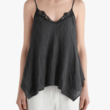 Black top worn by a person, showing the top's fit